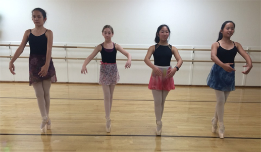 students on pointe doing line work